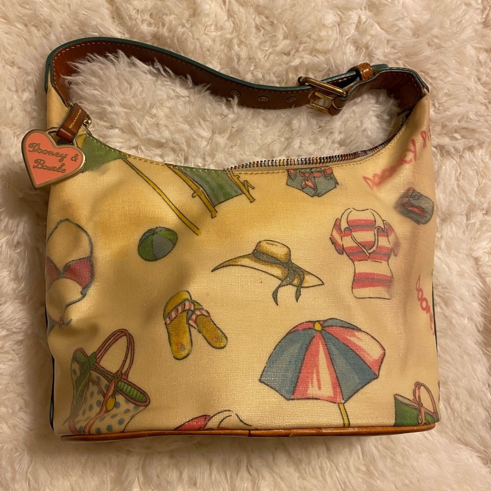 Well loved Dooney & Bourke handbag